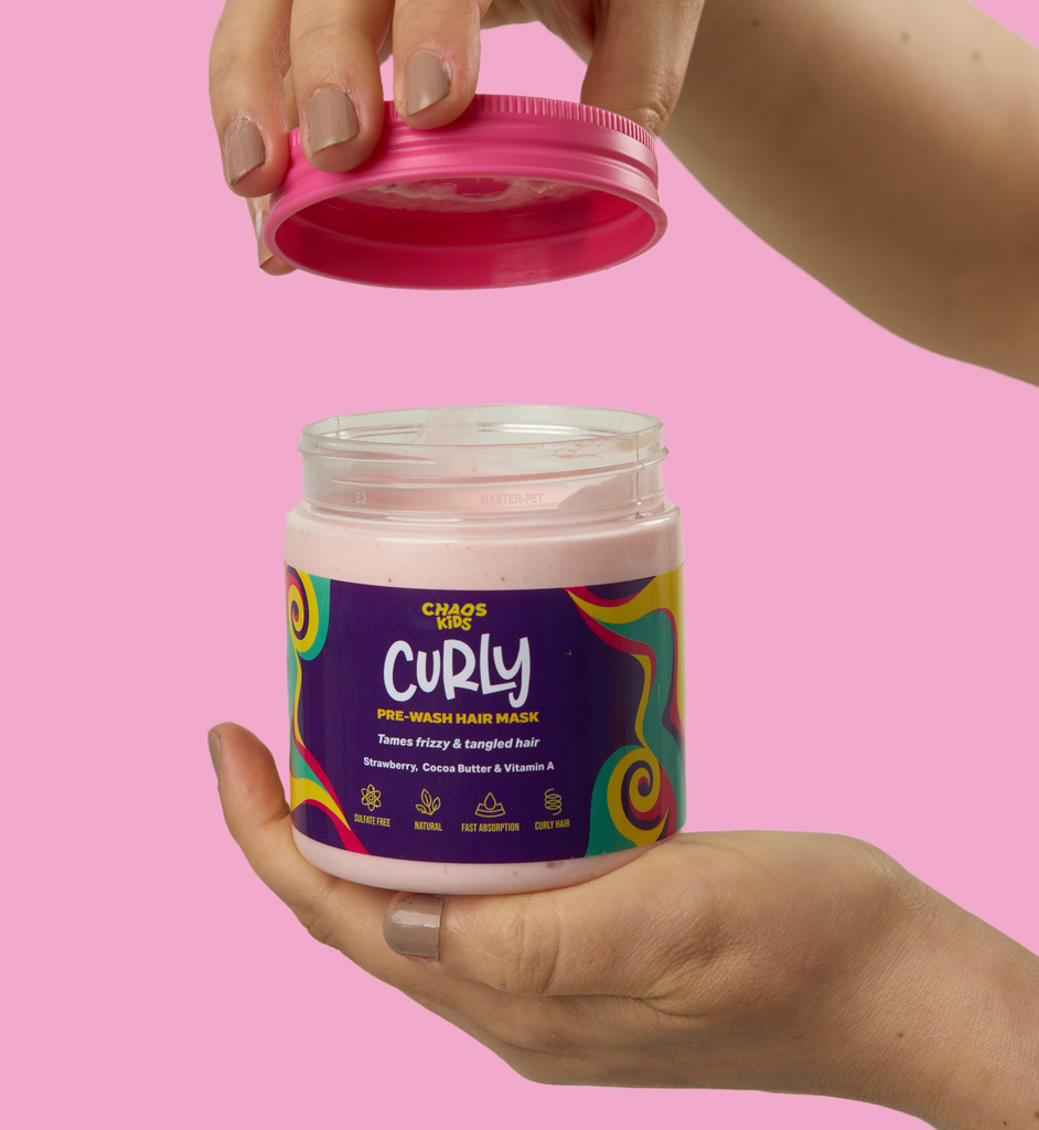Chaos Curly for curly Hair, tangled, and frizzy hair. Moisturizing and detangling cocoa butter and mango oil with strawberry to make it easy to brush your kid’s hair and define those locks. Use before shampoo.